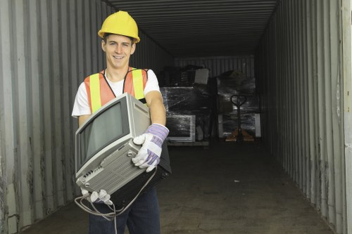 Collected bulky waste and furniture ready for disposal in Putney